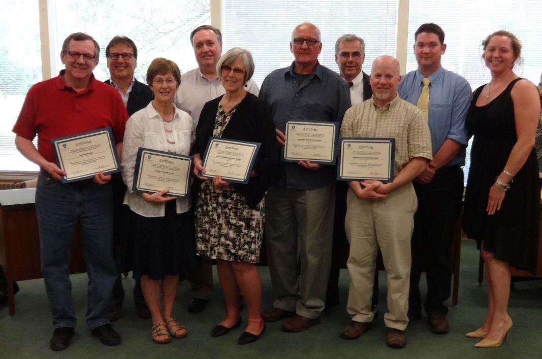 Picture of grant winners holding their certificates