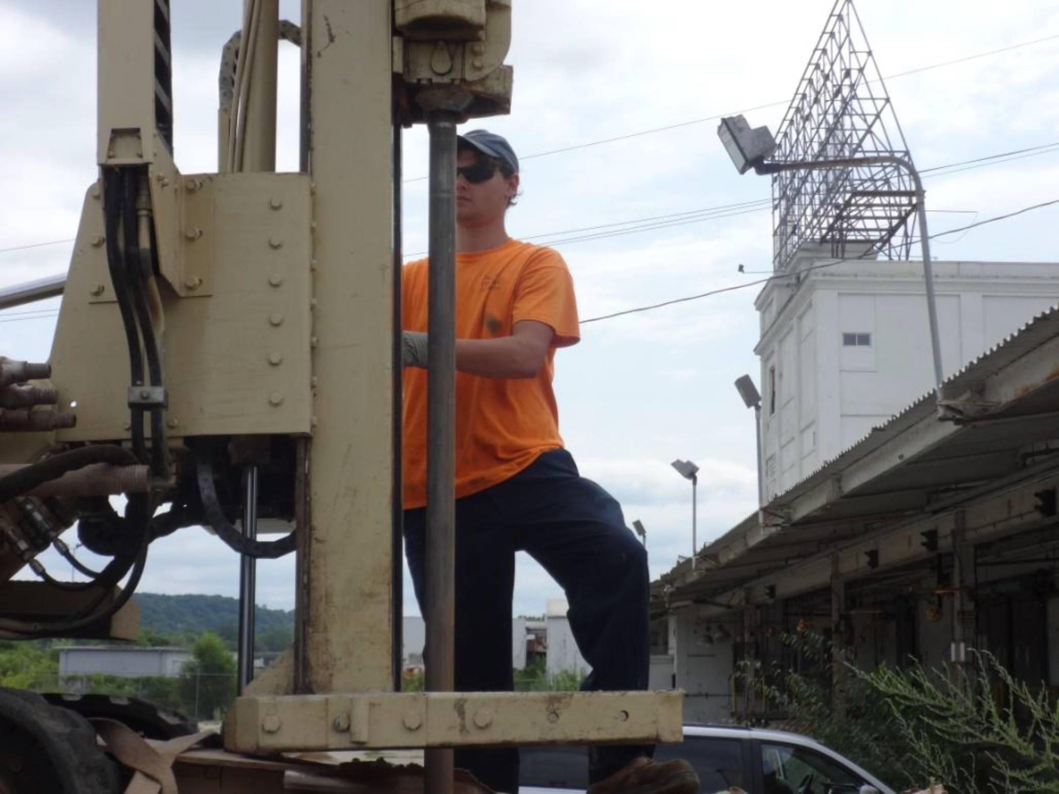 A member of Talon Drilling Company unloads the Geoprobe, which was the piece of equipment used throughout the property to drill for subsurface samples.